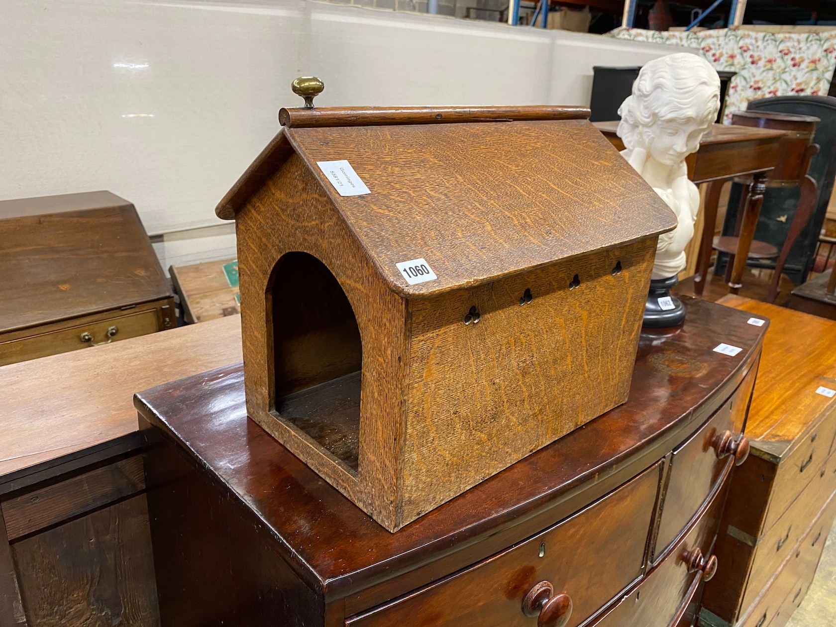 A small Arts & Crafts oak dog kennel, width 45cm, depth 31cm, height 40cm